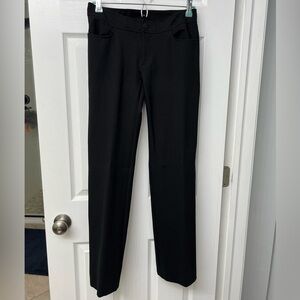 Anne Klein black boot-cut mid-rise dress pants, button and zipper closure.